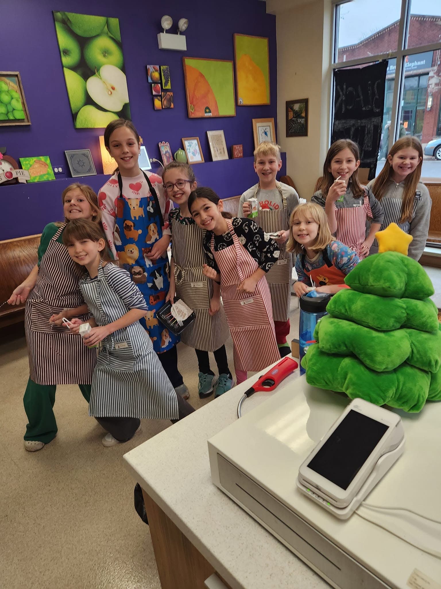 A happy group showing off the candy they made together